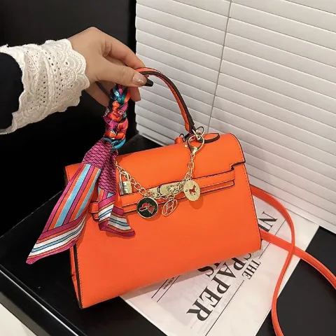 Жіноча сумка через плече з декоративним ланцюжком у стилі Hermes помаранчева, арт. Hs1/orange