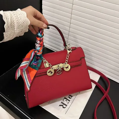 Жіноча сумка через плече з декоративним ланцюжком у стилі Hermes червона, арт. Hs1/red